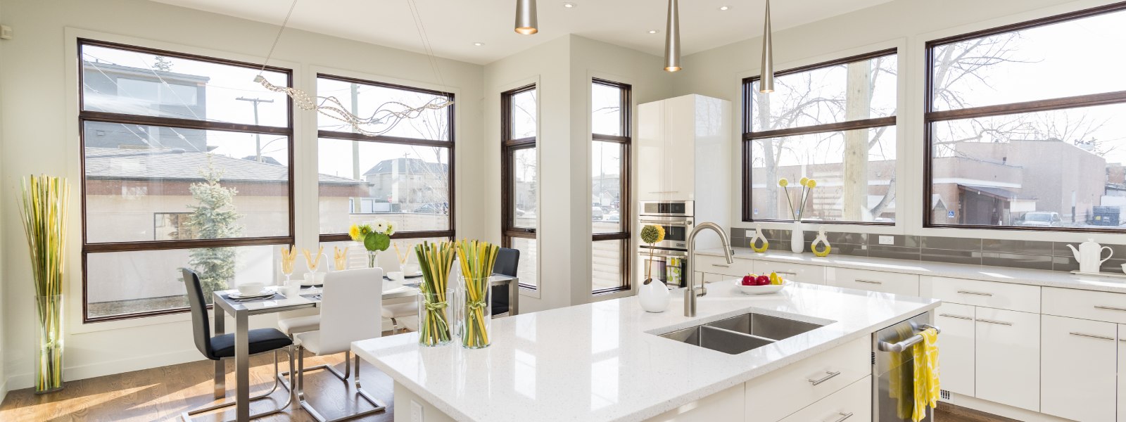 Alpine White Quantum Quartz kitchen countertop in a modern white kitchen.
