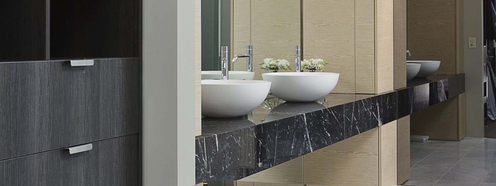 Modern bathroom with black marble stone countertop