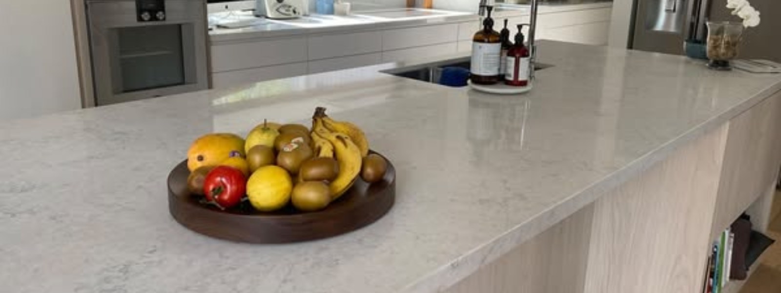 Flush mounted hotplate installed on Lagos Grey Stone Ambassador kitchen countertop