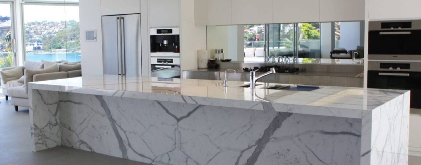 Modern kitchen with a large marble benchtop