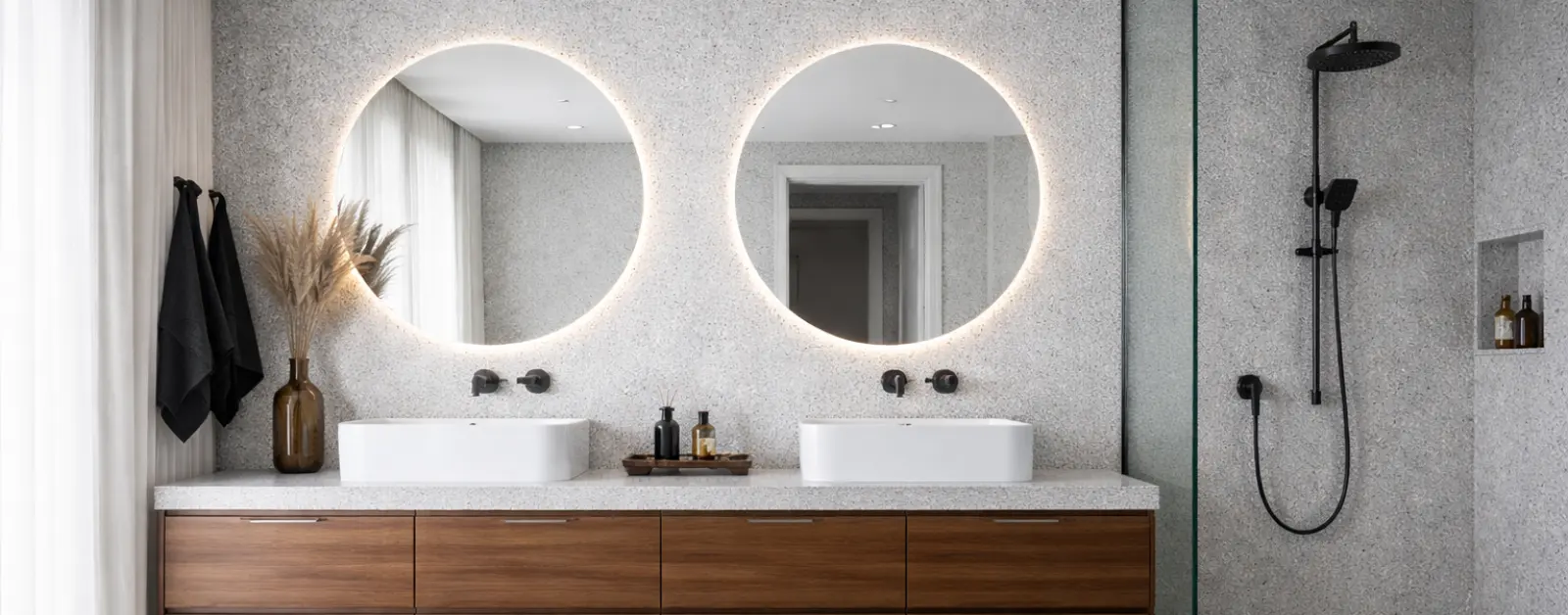 Grey speckled granite stone wall finish used in a modern bathroom design