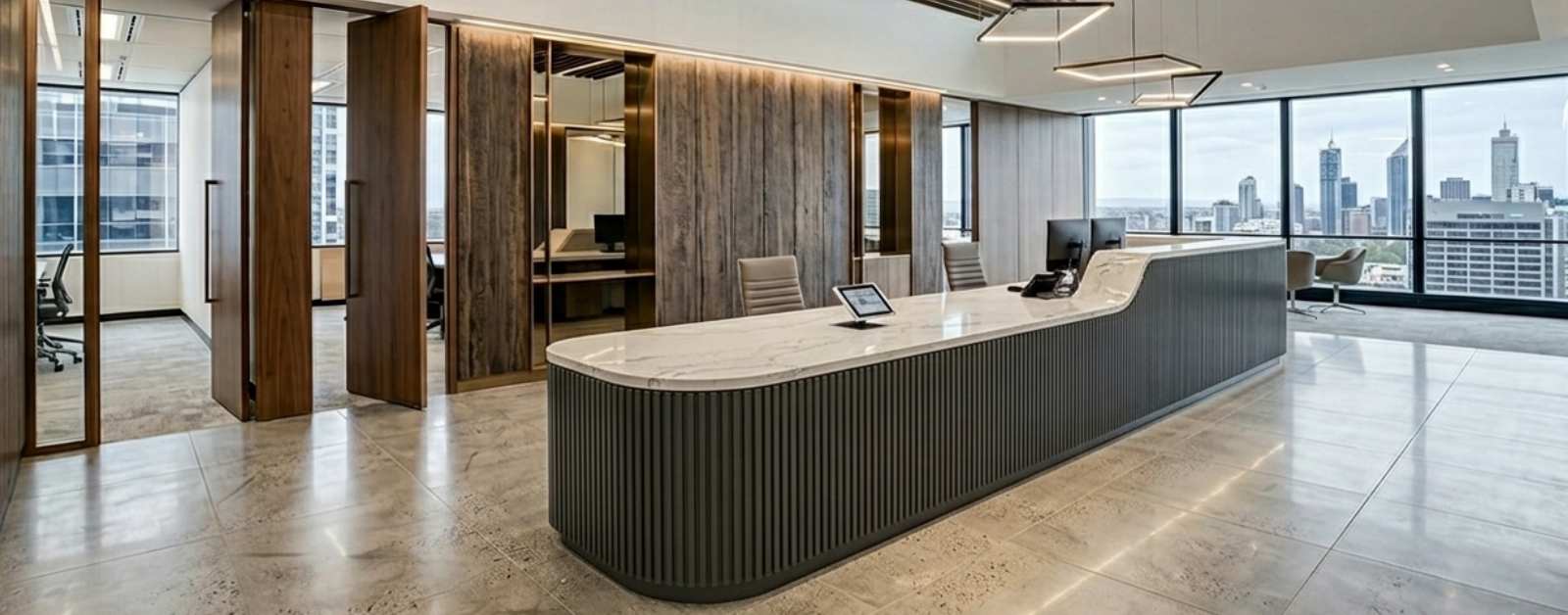 modern office reception area featuring a large Caesarstone desk