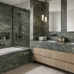 Bathroom featuring a Verde Fusion granite vanity and accent walls.